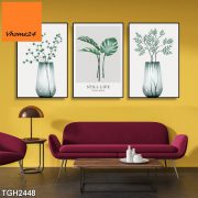 Bright yellow living room interior with a concrete floor, a dark red soft sofa, and a coffee talbe. A poster. 3d rendering mock up